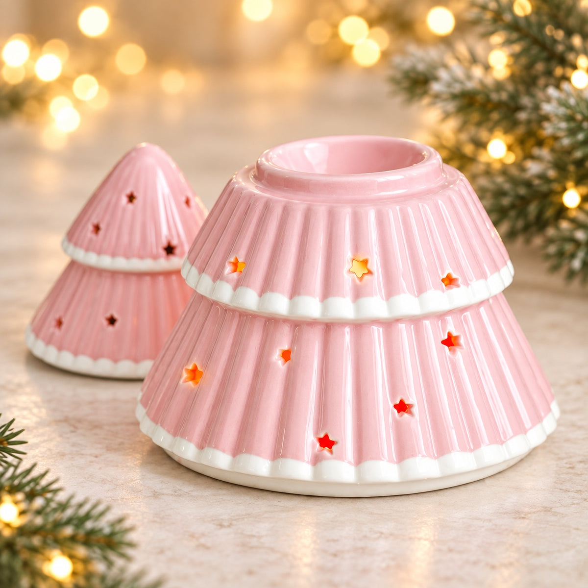 Pink Christmas tree wax melter opened to show dish