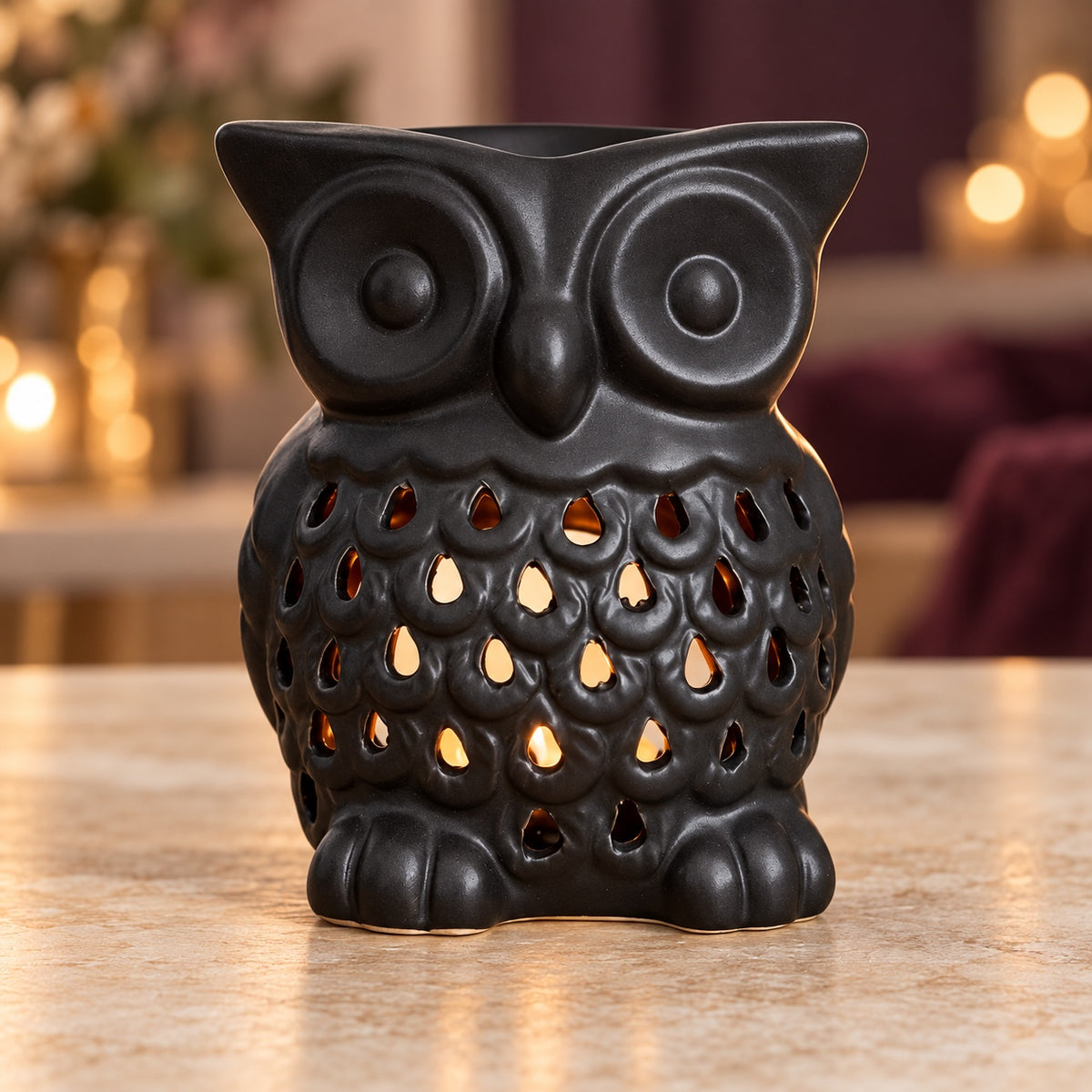 Black ceramic owl wax warmer, front view