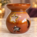 Brown ceramic moon and star wax warmer