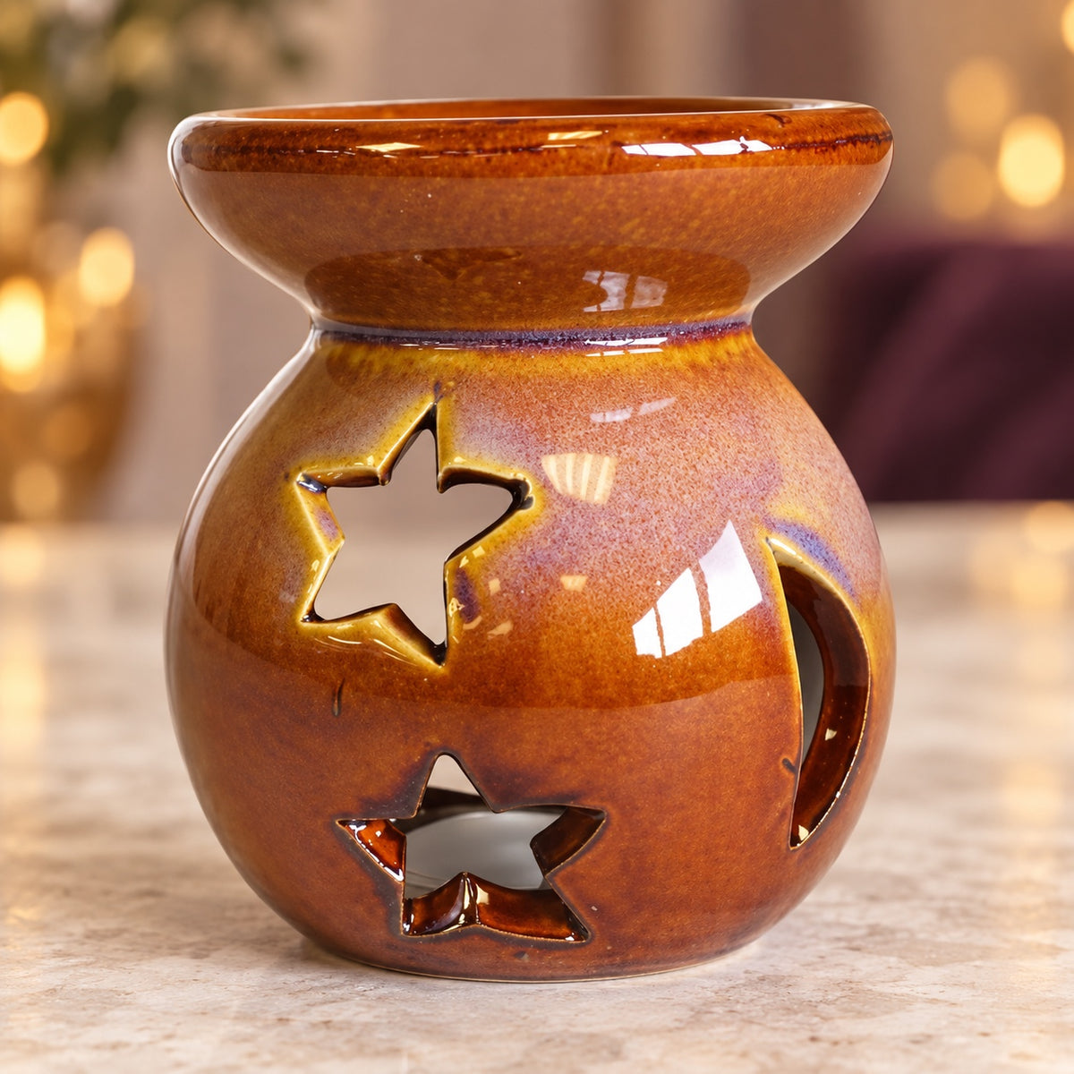 Brown ceramic moon and star wax warmer