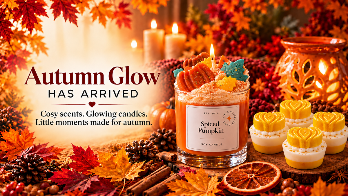 Autumn Glow has arrived: lit Spiced Pumpkin candle and yellow and white wax melts in a warm autumn setting.