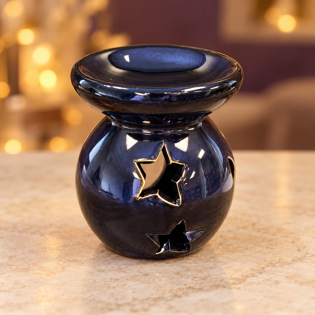 Dark glazed ceramic moon and star wax warmer